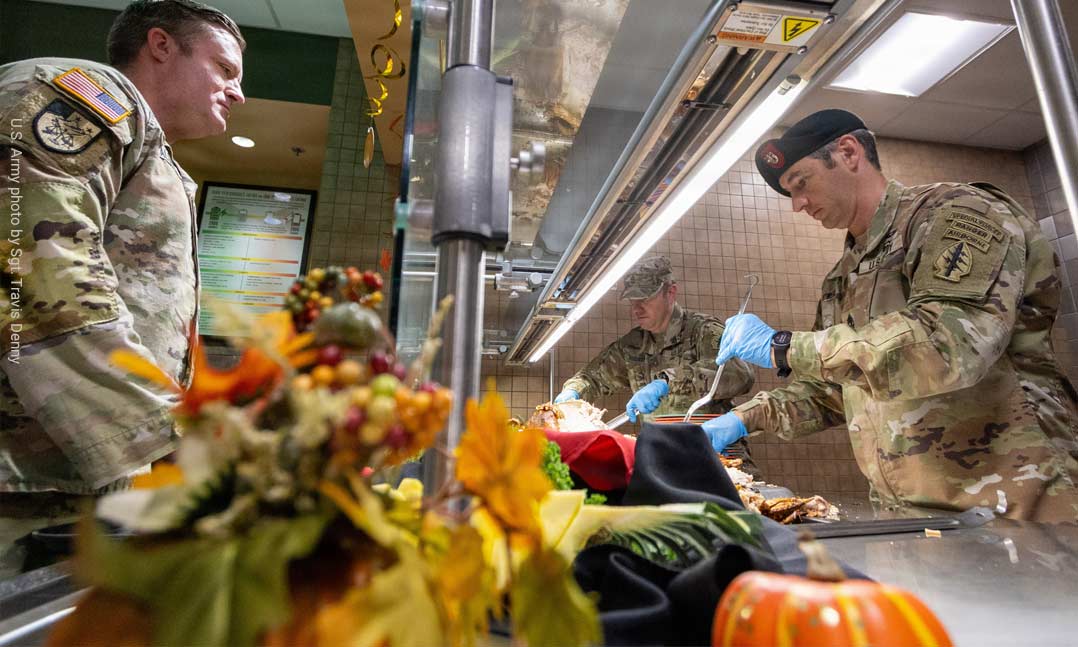 Leaders of the 7th Special Forces Group (Airborne), served this year's Thanksgiving meal at the dining facility on Camp 