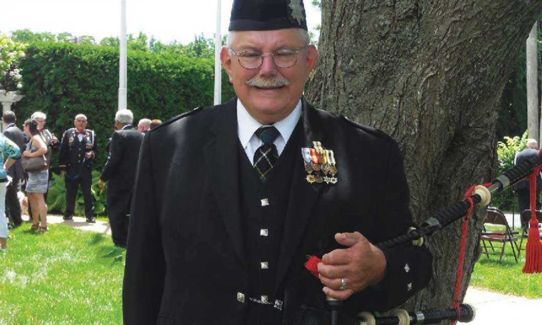 VFW life member Frederick Benda Jr. takes a break after performing during a wedding on April 18, 2022.