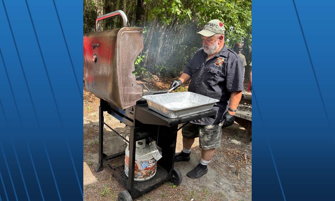 VFW Post 2811 Quartermaster Avery Owen mans the grill on June 14 for a sendoff picnic for members of the 257th Transportation Battalion, 399th Movement Control Team