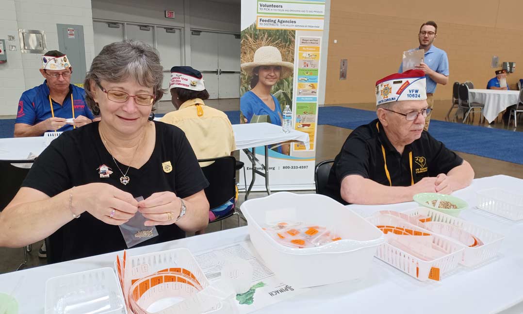 VFW and VFW Auxiliary members sort and pack seeds to fight food insecurity at VFW National Convention 2025