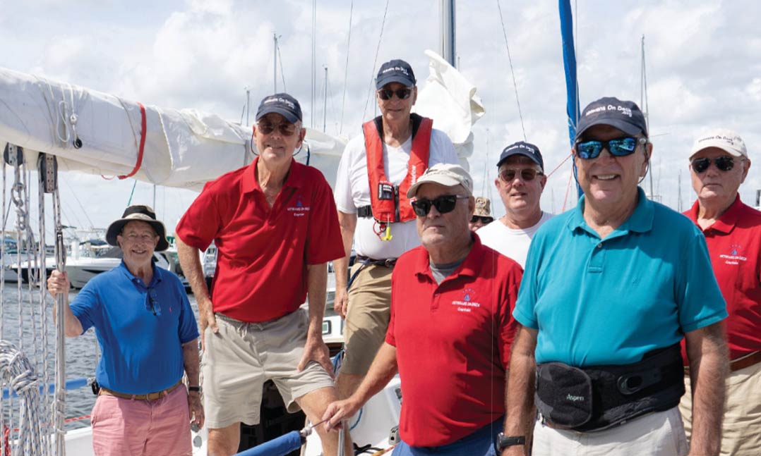 Volunteers with Charleston, S.C.-based Veterans on Deck (VoD) gather on a sailboat last October