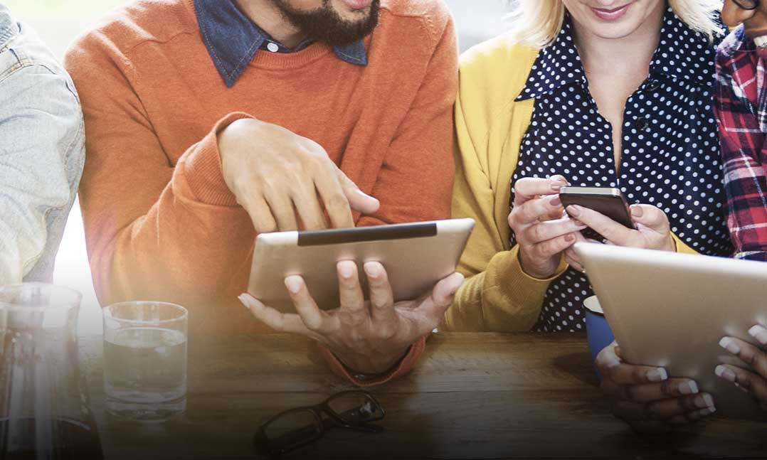 Friends at a table making plans