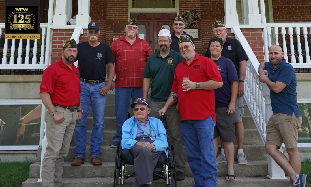 Othmar Jasper, seated, is flanked by his fellow members of VFWPost 2661 in June outside the Post home in Washington, Missouri
